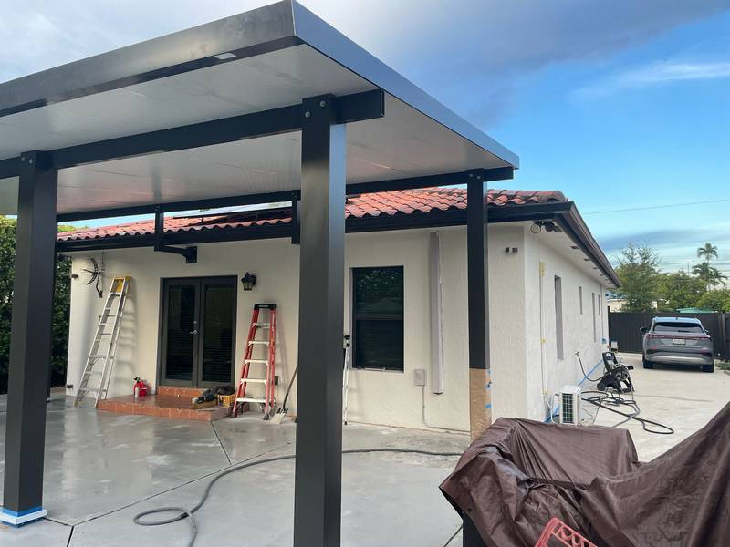 Covered patio with cozy seating area